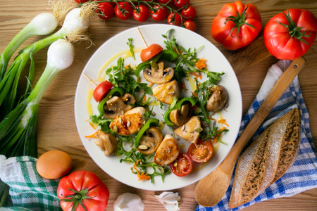Turkey skewers with mushrooms and vegetables. Top view table.の写真素材