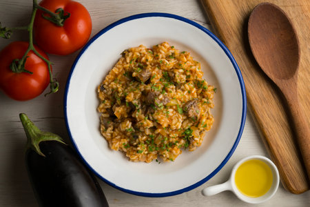 Rice paella with Iberian pork cheek. Top view table.の写真素材