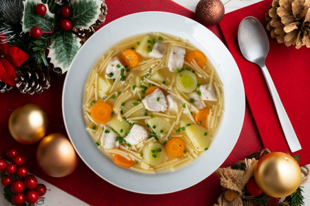 Fish, noodle and vegetable soup. Top view table.の写真素材
