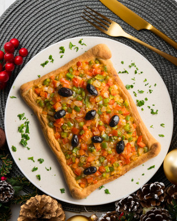 Coca de trampo mallorca with vegetables. Top view table with decorations.の写真素材