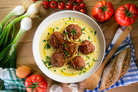 Fried meatballs with curry sauce. Top view table with decoration.の写真素材