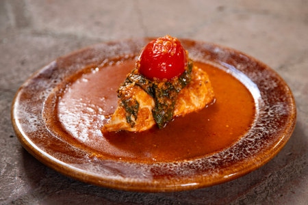 Mole de segueza with chicken is a traditional recipe from Oaxaca made with yellow cracked corn, pitiona and guajillo chili, among other ingredients.の写真素材