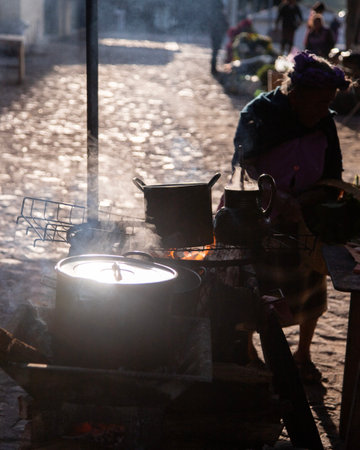 Clay and iron pots at a street food stand in Oaxaca cooking traditional Mexican cafe de roca.の写真素材