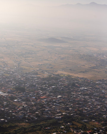 Views from the southern mountains of Oaxaca of the community of Teotitlan del Valle in the Central Valley of the Oaxaca region in Mexico.の写真素材