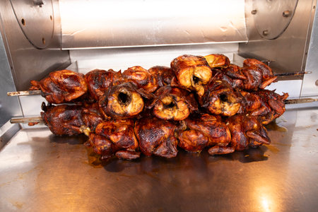 Roast chicken stand at the Oaxaca food market in Mexico.の写真素材