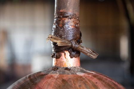 Mezcal is fermented and distilled in copper still tanks in artisanal palenques in the Oaxaca region...
