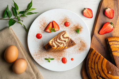 Beautiful and delicious zebra cake decorated with lines of organic chocolate.の写真素材