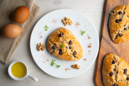 Triangular English scones with dark chocolate chips.