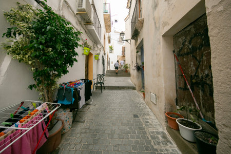 Streets and views of the ancient walled citadel of Dalt Vila, a UNESCO World Heritage Site, on the island of Ibiza in Spain.の写真素材