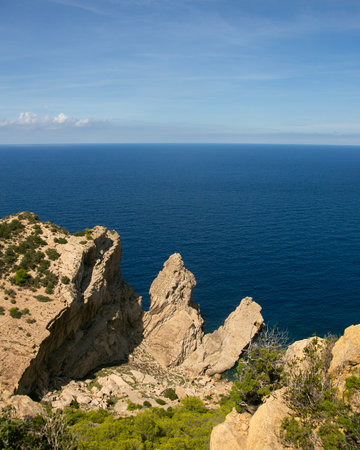 Stunning views of the cliffs of Cap de Balansat on the island of Ibizaの写真素材