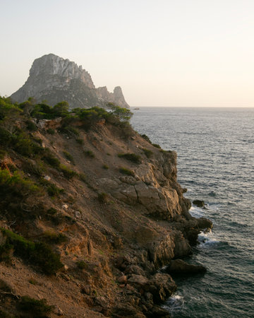 Wonderful cliffs overlooking the wild beach of Cala Sardina on the island of Ibiza.の写真素材