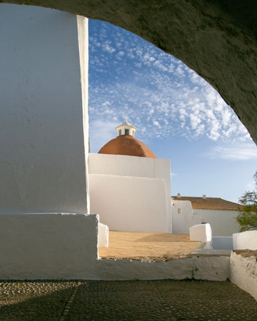 Beautiful white church of Puig de Misa in Santa Eulalia des Riu on the island of Ibiza.の写真素材
