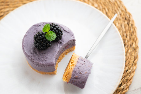 Blackberry mousse tart with a biscuit base. Traditional French recipe.の写真素材