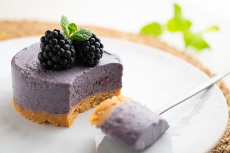 Blackberry mousse tart with a biscuit base. Traditional French recipe.の写真素材