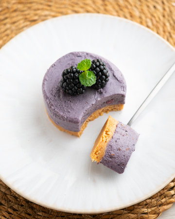 Blackberry mousse tart with a biscuit base. Traditional French recipe.の写真素材