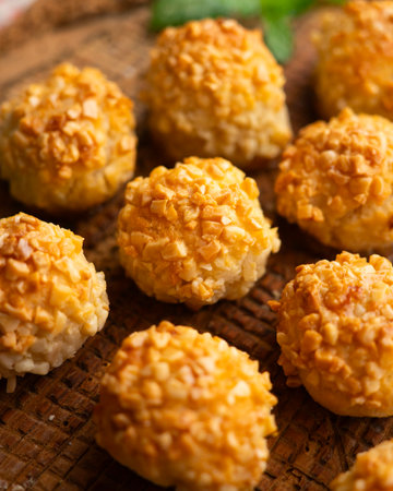 Panellets with pine nuts and almonds. A typical Catalan dessert made with marzipan and nuts.の写真素材
