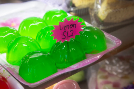 Flavored flans and colorful gelatins at a market stall in Mexico City.