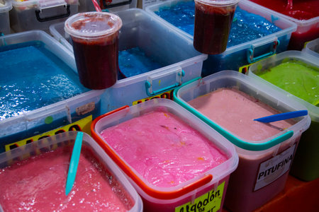 Chamoy, or a colorful michelada sauce, is sold at the San Juan Market in Mexico City.の写真素材