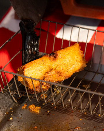 Street food stand serving fried tamales in Mexico City.