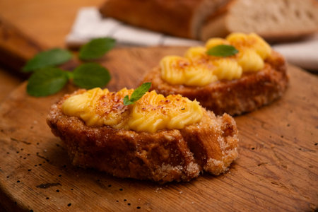 Torrijas with burnt cream. French Toast with Custard and Caramelized Sugar, Garnished with...