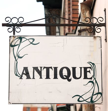 Old antique hanging rusted plate, logoの写真素材