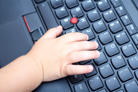 Using laptop for bussines figures, data sheet, children, kidsの写真素材