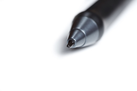 Close up shot of digital pen and nibs with penholder blured in the backgroundの写真素材