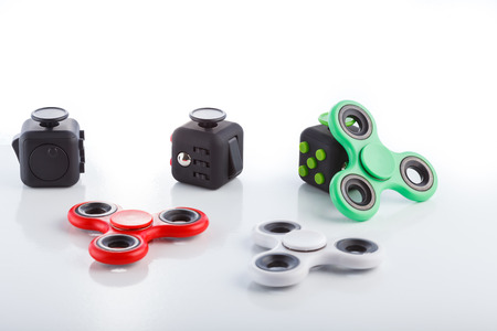 Anti stress and relaxation fidgets, cube and spinner for exhausted peopleの写真素材