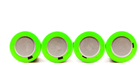 Used rechargeable batteries isolated on white backgroundの写真素材