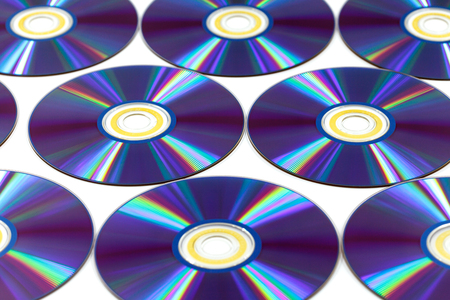Bunch of cd discs on a white backgroundの写真素材