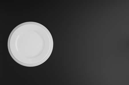 kitchen and restaurant utensils, plates, on a dark backgroundの写真素材