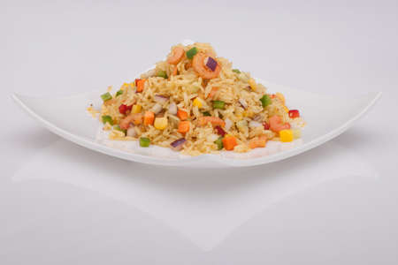 salad in a white plate on a white backgroundの写真素材