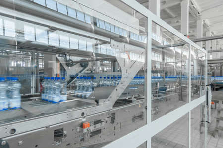 for the production of plastic bottles and bottles on a conveyor belt factory