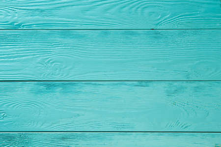 background of wooden boards painted light blue and turquoise