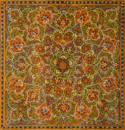 bright and multi colored oriental decorative painting on a wooden board