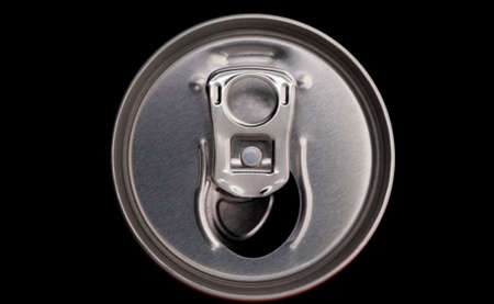 top of  a can tin close-up on a black background