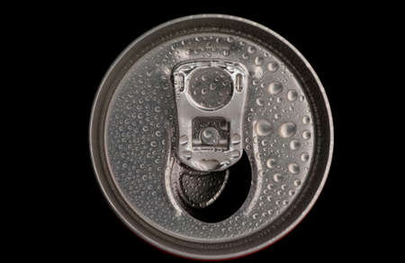 top of a can tin with water drops close-up on a black background