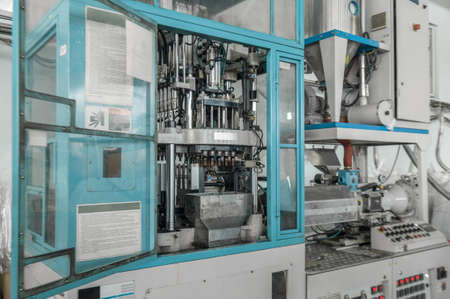 equipment for the manufacture of preforms for plastic bottles. PET production.の写真素材