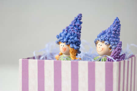 souvenir figurines of two girls in a gift boxの写真素材