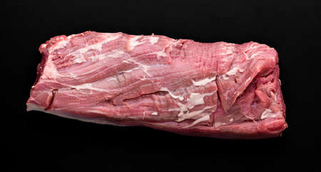 raw beef on black background close-up. the view from the topの写真素材