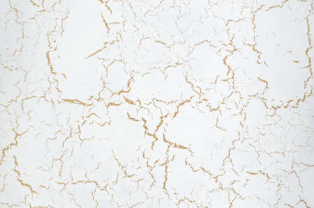 background of the stucco texture with the effect of dried clay. artistic background handmadeの写真素材