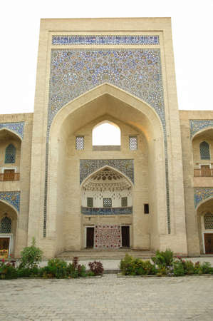 High arch and door with traditional Oriental mosaic. the ancient buildings of medieval Asiaのeditorial素材