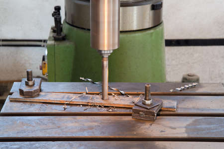 Drilling machine in the working process, close-up