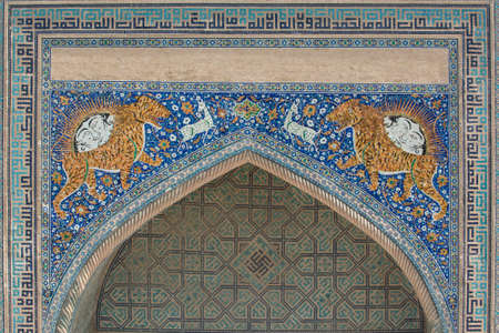 Arch with traditional ancient Asian mosaic. The details of the architecture of medieval Central Asiaの写真素材