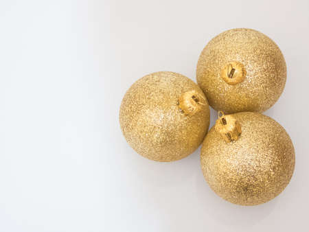 christmas balls gold color on a white background, top viewの写真素材