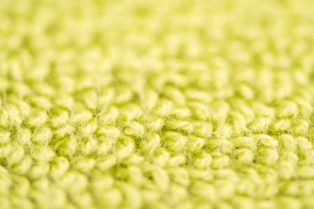 bath towel bright green color, macro shooting. textured fabric backgroundの写真素材