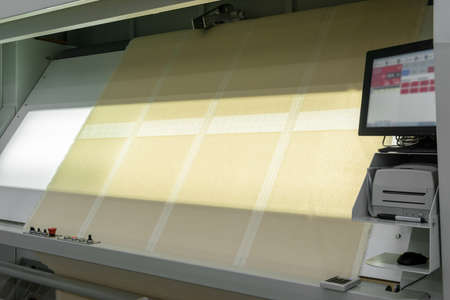 textile products and fabric in slides on lamp backlit screen