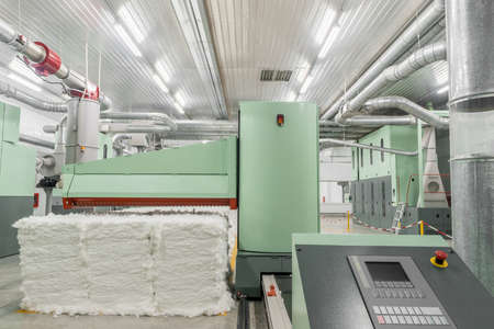 carding machine in spinning workshop. equipment and technologies at the textile factory