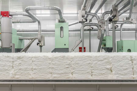 carding machine in spinning workshop. equipment and technologies at the textile factory