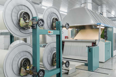 machine evaporates textile yarn. machinery and equipment in a textile factory